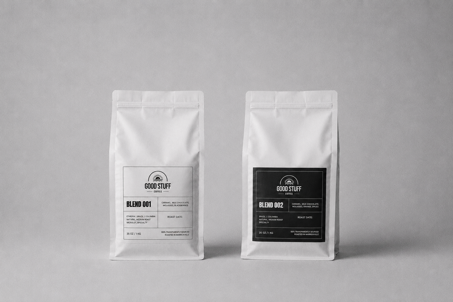 Two white stand-up coffee bags on a light gray background, labeled GOOD STUFF with Blend 001 on the left and Blend 002 on the right.